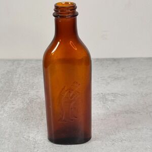Vintage Amber Glass Bottle Embossed Scott's Emulsion Cod Liver Oil Fisherman